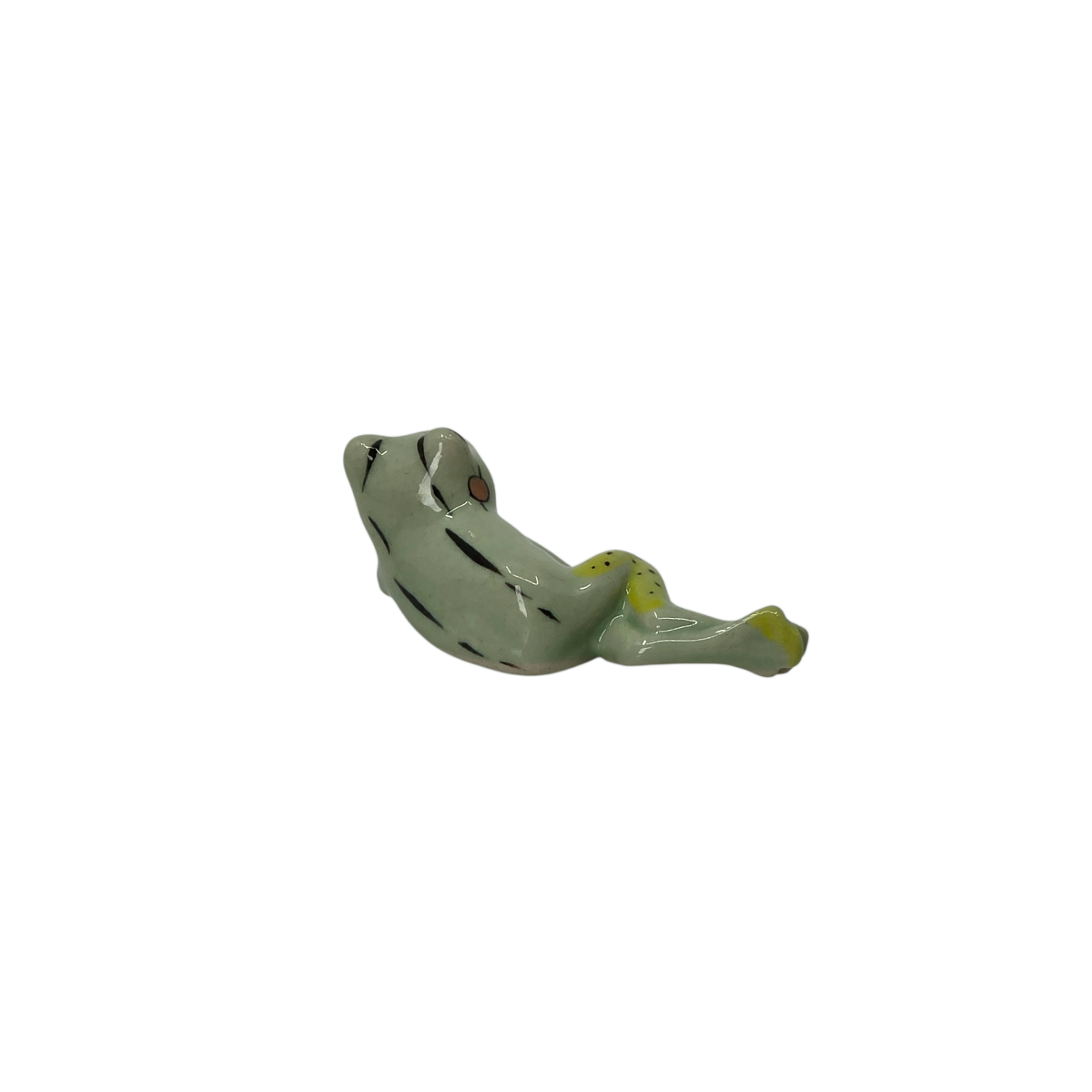 Miniature Frog Figurine Lying on its side