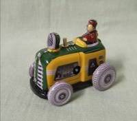 Wind Up Tin Toy Farmer On Tractor